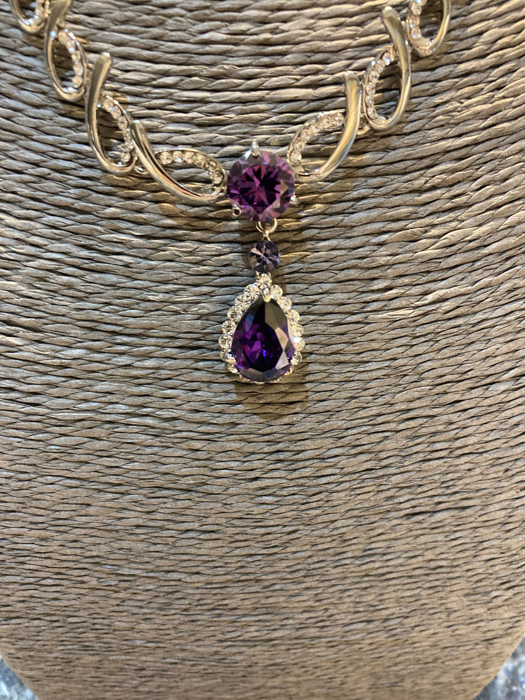 Double drop Amethyst coloured pendant and matching earrings.